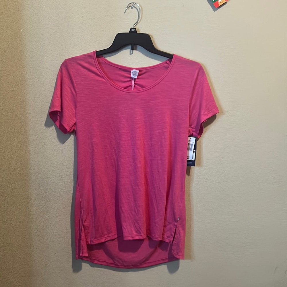 A pink Marika tee.